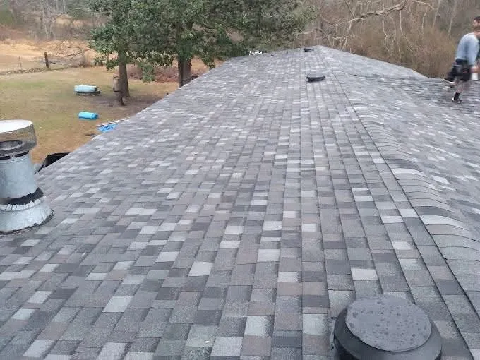 New gray architectural shingles with roof vents